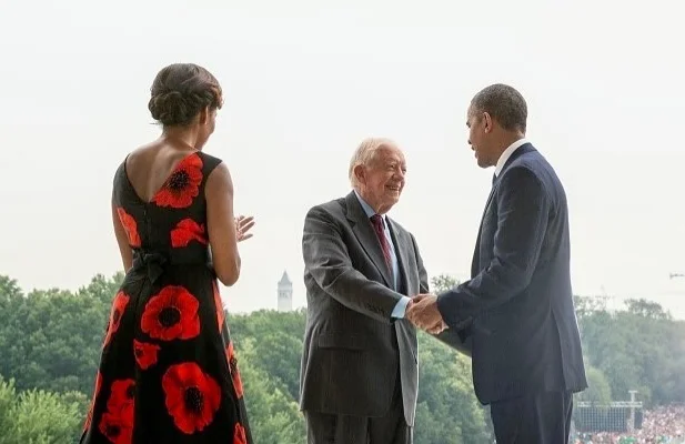 Michelle Obama, Jimmy Carter e Barack Obama