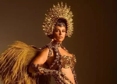 Paolla Oliveira desfilou vestida de onça pela Grande Rio