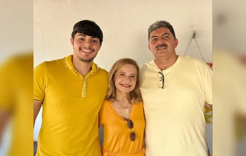 Prefeita junto de seu marido e filho