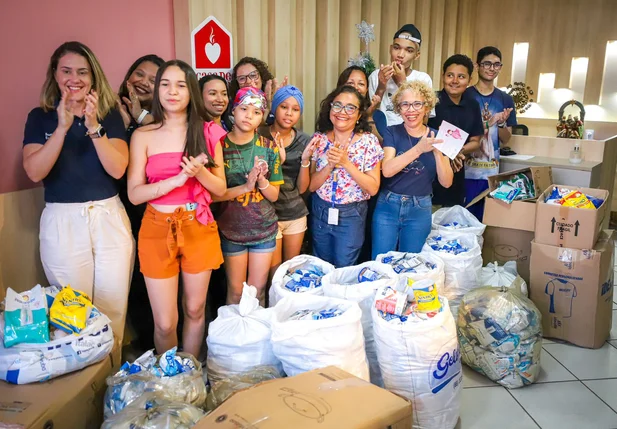 Entrega do leite arrecadado com a Corrida Equatorial